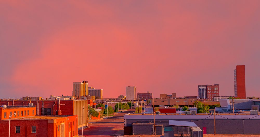 Looking,Down,At,The,Downtown,District,With,A,Brilliant,Sunset